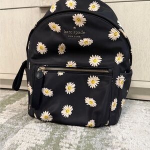 Kate Spade Black Backpack with Daisy Pattern